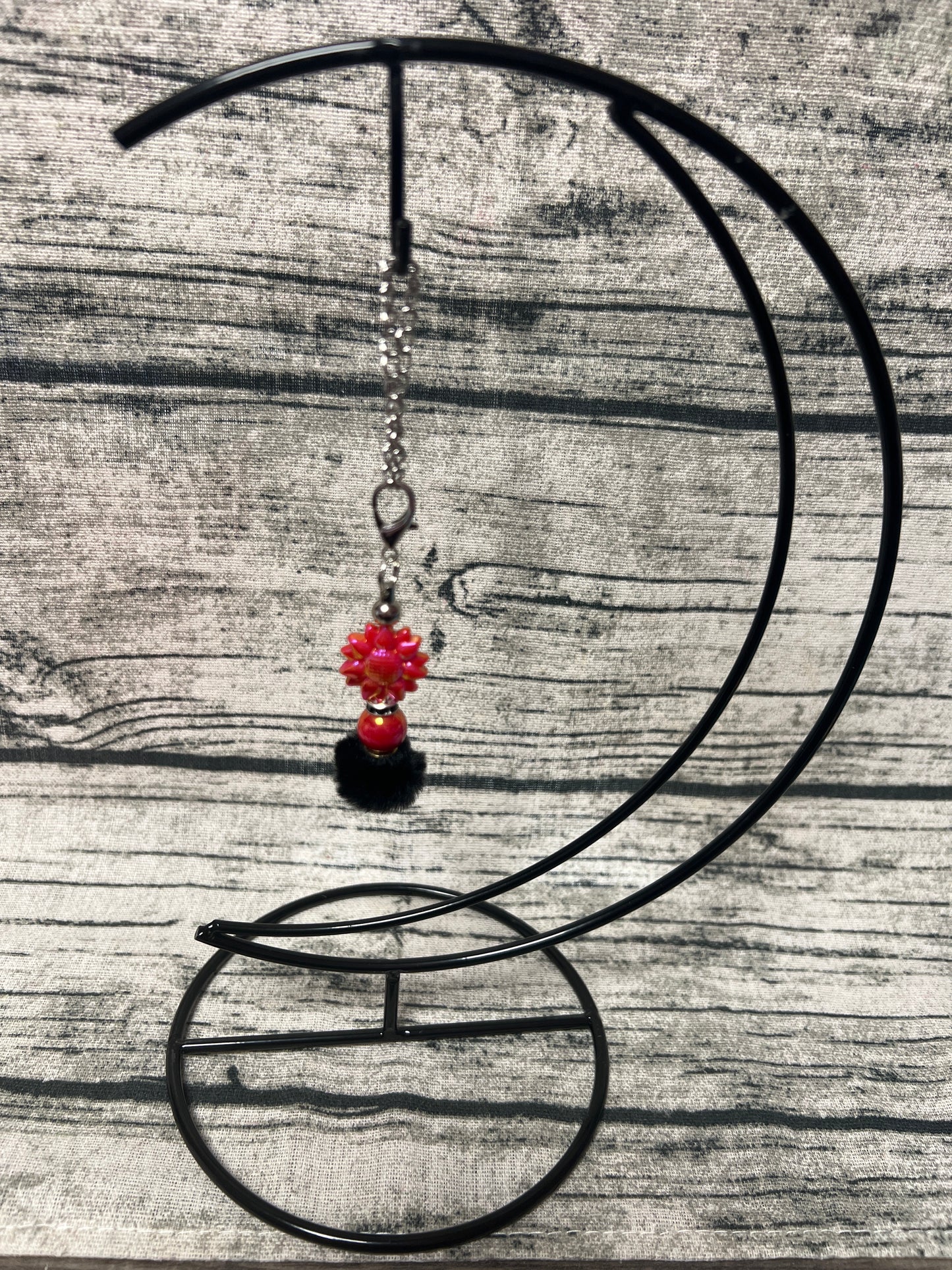 Iridescent red flower dangle